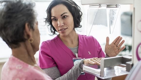 Lady getting a mammogram